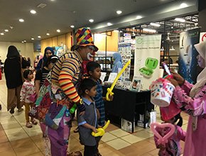 Mini Karnival 2018 event with a clown