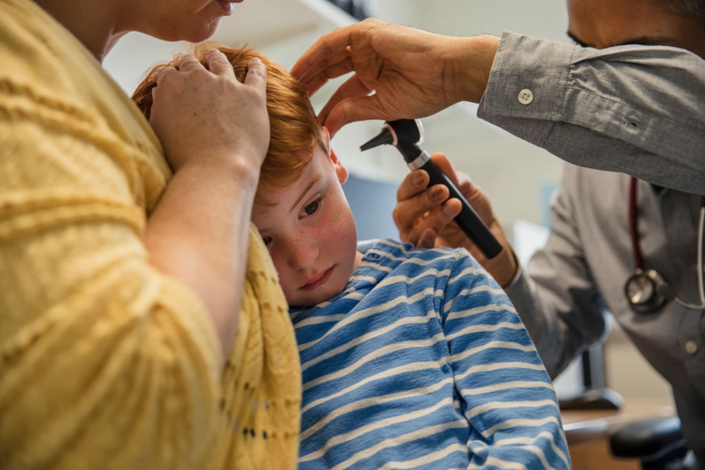 kids getting ear test for infection