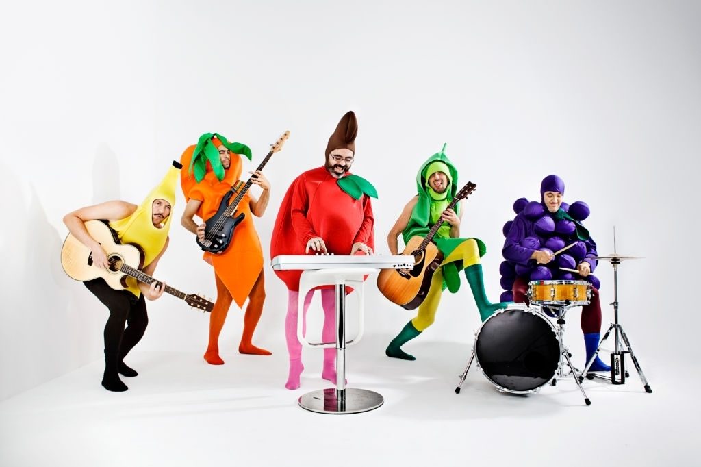 Rock band dressed up as vegetable