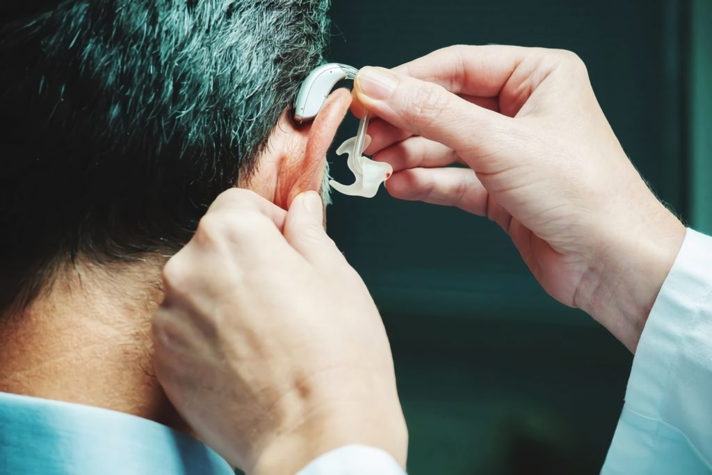 adjusting hearing aid