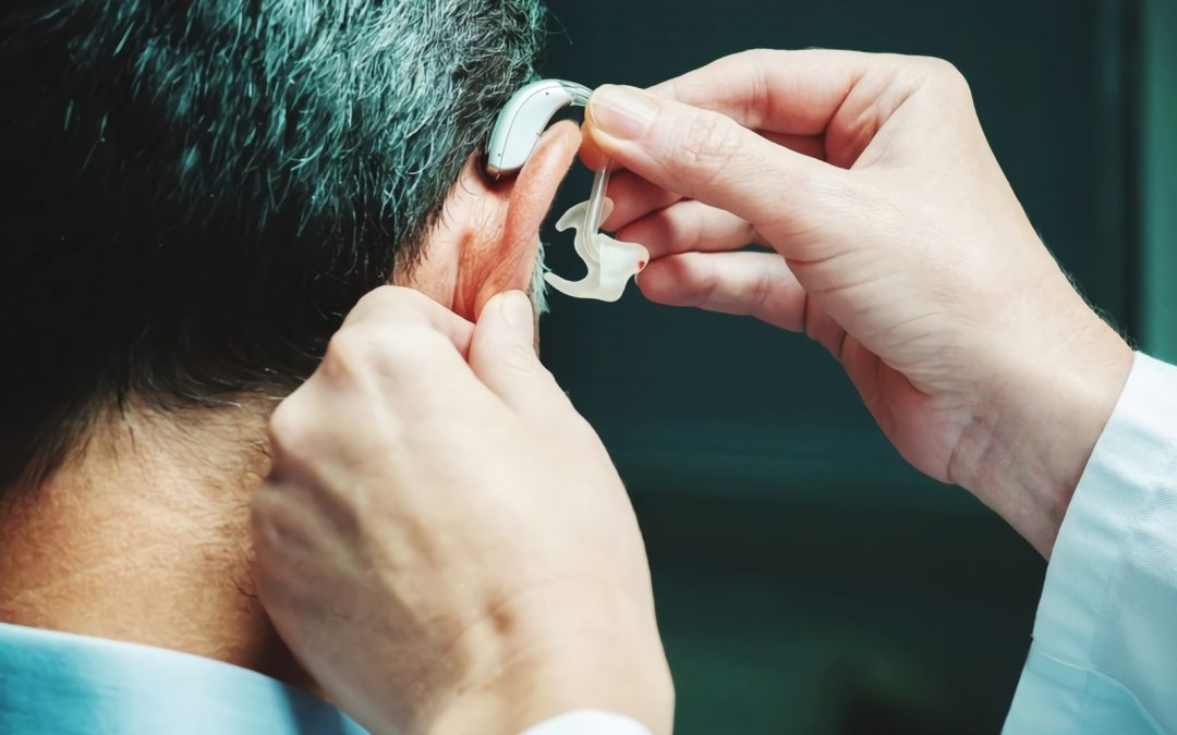 adjusting hearing aid