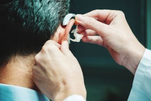 adjusting hearing aid